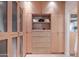 Spacious walk-in closet featuring custom shelving and ample storage space at 5434 E Lincoln Dr # 58, Paradise Valley, AZ 85253