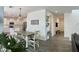 Open concept living area features modern kitchen, dining area, and comfortable living room at 5549 S Dillon --, Mesa, AZ 85212