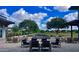 Inviting outdoor lounge area with comfortable seating and fireplace, perfect for relaxation and social gatherings at 5549 S Dillon --, Mesa, AZ 85212