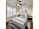 Bedroom featuring vaulted ceilings, ceiling fan, and shutters at 5640 E Bell Rd # 1098, Scottsdale, AZ 85254