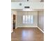 Dining area with wood floors, shuttered windows, and modern lighting offers a versatile space at 5640 E Bell Rd # 1098, Scottsdale, AZ 85254