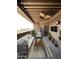 Cozy covered patio with ceiling fan, plush seating, area rug, and outdoor television at 5640 E Bell Rd # 1098, Scottsdale, AZ 85254