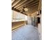 Outdoor patio space with tiled flooring, ceiling fan, sliding glass doors, and a privacy wall at 5640 E Bell Rd # 1098, Scottsdale, AZ 85254