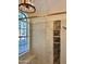 Glass shower features tile accents and a window at 5640 E Bell Rd # 1098, Scottsdale, AZ 85254
