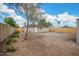 Backyard showing dirt and a newly installed wood fence at 6231 S 2Nd Ave, Phoenix, AZ 85041