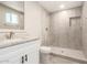 Modern bathroom with granite vanity and stand up shower at 6231 S 2Nd Ave, Phoenix, AZ 85041