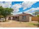 Single story home featuring a desert landscaped front yard with walkway at 6231 S 2Nd Ave, Phoenix, AZ 85041