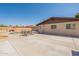 Spacious backyard features a refreshing pool, patio furniture, and a built-in grill perfect for outdoor entertaining at 6244 W Clouse Dr, Phoenix, AZ 85033