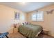 Comfortable bedroom featuring neutral paint, carpeted floors, and an enclosed closet at 6244 W Clouse Dr, Phoenix, AZ 85033