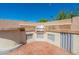 Built-in outdoor kitchen featuring a stainless steel grill, sink, electrical outlets, and storage at 6244 W Clouse Dr, Phoenix, AZ 85033