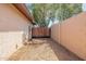 Fenced side yard with gated access, offering privacy and functionality at 6244 W Clouse Dr, Phoenix, AZ 85033