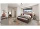 Bright bedroom featuring a plush bed, stylish rug, and ample natural light at 6556 N 43Rd Ave, Glendale, AZ 85301
