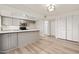 Renovated kitchen featuring stainless steel appliances, white countertops, and ample cabinet space at 6556 N 43Rd Ave, Glendale, AZ 85301