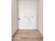 Empty laundry room with hardwood floors and white walls ready for washer and dryer hookups at 6556 N 43Rd Ave, Glendale, AZ 85301
