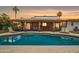Beautiful backyard pool with outdoor seating and covered patio, perfect for relaxing and entertaining at 6611 E Voltaire Ave, Scottsdale, AZ 85254