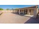 Spacious backyard with a gravel ground cover, and a covered patio perfect for enjoying outdoor living at 7516 W Mary Jane Ln, Peoria, AZ 85382