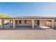 Spacious backyard includes a covered patio area, perfect for outdoor gatherings and relaxation at 7516 W Mary Jane Ln, Peoria, AZ 85382