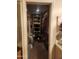 Organized walk-in closet with shelving and hanging storage at 7646 E Miami Rd, Scottsdale, AZ 85258