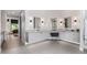 Spacious Primary bathroom with double vanities, modern lighting, and tile floors at 9627 E Adobe Dr, Scottsdale, AZ 85255