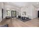 Bright living room with hardwood floors and lots of natural light at 9627 E Adobe Dr, Scottsdale, AZ 85255