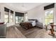 Bright primary bedroom with natural light and desert views through several windows at 9627 E Adobe Dr, Scottsdale, AZ 85255