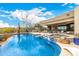 Outdoor pool and patio area ideal for entertaining, with desert landscaping and plenty of seating at 9627 E Adobe Dr, Scottsdale, AZ 85255