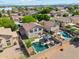 Aerial view showcases a neighborhood with pools, well-kept landscaping and a relaxing atmosphere at 991 W Leah Ln, Gilbert, AZ 85233