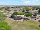 Community playground with covered seating, surrounded by well-maintained homes and landscaping in a vibrant neighborhood at 991 W Leah Ln, Gilbert, AZ 85233