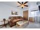 Cozy bedroom with a ceiling fan and closet offering comfortable living at 111 S Greenfield Rd # 611, Mesa, AZ 85206