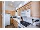 Functional kitchen with white appliances and ample countertop space at 111 S Greenfield Rd # 611, Mesa, AZ 85206