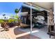 Well-maintained RV parking featuring a seating area, mature landscaping, and space for relaxation at 111 S Greenfield Rd # 784, Mesa, AZ 85206