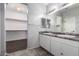 Bathroom features double vanity sinks and walk-in closet access at 11505 W Boca Raton Rd, El Mirage, AZ 85335