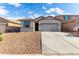 Charming single-story home with a well-maintained yard and a spacious two-car garage at 11505 W Boca Raton Rd, El Mirage, AZ 85335