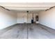The garage includes concrete floors, and a white door at 11505 W Boca Raton Rd, El Mirage, AZ 85335