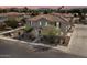 Aerial view of a two-story home with a tile roof, manicured desert landscaping, and a private entrance at 1317 N Balboa --, Mesa, AZ 85205