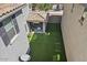 This home features a private backyard with artificial turf, a covered patio, and plenty of space for entertaining at 1317 N Balboa --, Mesa, AZ 85205