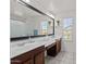 Bathroom featuring double sinks, vanity, and decorative mirror at 1317 N Balboa --, Mesa, AZ 85205