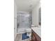 Modern bathroom with updated features, including a glass-enclosed shower, sleek vanity, and stylish flooring at 1317 N Balboa --, Mesa, AZ 85205