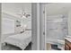 Comfortable bedroom next to the bathroom with a combination of the bedroom and bathroom in the frame at 1317 N Balboa --, Mesa, AZ 85205