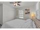Cozy bedroom with a soft color palette, recessed lighting, and a ceiling fan at 1317 N Balboa --, Mesa, AZ 85205