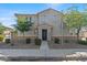 Attractive two-story home with desert landscaping, neutral colors, and a welcoming front entry at 1317 N Balboa --, Mesa, AZ 85205