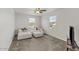 Inviting living room featuring a plush white sectional sofa and a modern entertainment center at 1317 N Balboa --, Mesa, AZ 85205
