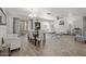 Bright, open living room with a dining area and comfortable white furniture for relaxing and entertaining at 1317 N Balboa --, Mesa, AZ 85205