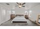 Spacious main bedroom featuring carpet, ceiling fan, and natural lighting at 1317 N Balboa --, Mesa, AZ 85205