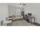 Bright home office featuring a comfortable sofa and a modern desk setup at 1317 N Balboa --, Mesa, AZ 85205