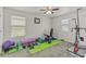Home workout room equipped with a weight bench, weights, and mats for a complete fitness experience at 1317 N Balboa --, Mesa, AZ 85205