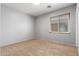 Bedroom featuring carpet and window with blinds at 13259 W Flower St, Litchfield Park, AZ 85340