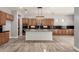 Open kitchen featuring wooden cabinets and granite countertops at 13259 W Flower St, Litchfield Park, AZ 85340