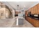 Bright kitchen featuring a large island with seating at 13259 W Flower St, Litchfield Park, AZ 85340
