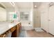 Spacious bathroom with double sinks, large mirror, and separate shower and tub at 13421 W Ocotillo Ln, Surprise, AZ 85374